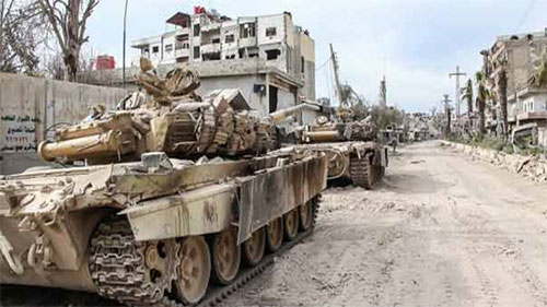 tanques sirios en las afueras de Daraya El Gobierno y las facciones armadas acuerdan poner fin al asedio de Daraya